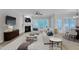 Inviting living room with fireplace, large windows, and stylish decor, adjacent to the dining area at 804 Harsworth Dr, Cary, NC 27519