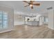 Open-concept living area with modern flooring, white trim, and seamless transition to the kitchen space at 804 Harsworth Dr, Cary, NC 27519
