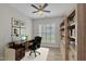 Bright office space with built-in shelving, a large window, desk space and a comfortable desk chair at 804 Harsworth Dr, Cary, NC 27519