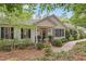 Charming home with beautiful landscaping and inviting front entrance at 826 Rushing, Pittsboro, NC 27312