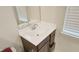 Bathroom featuring a vanity with a sink, a mirror, and neutral colored walls at 904 Romeria Dr, Durham, NC 27713