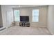 Bedroom with soft carpet and two windows for natural light at 904 Romeria Dr, Durham, NC 27713