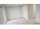 Spacious bedroom boasts slider door access, neutral carpet, and fresh paint at 904 Romeria Dr, Durham, NC 27713