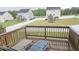 Spacious backyard with a trampoline, gazebo, and privacy fence visible from the outdoor deck at 904 Romeria Dr, Durham, NC 27713