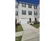 Charming townhome with a one car garage and a well-maintained front lawn at 904 Romeria Dr, Durham, NC 27713