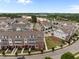Scenic aerial view of neighborhood showcasing rooftops, trees, and landscaping in residential area at 986 Gateway Commons Cir, Wake Forest, NC 27587