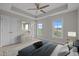 Bedroom featuring a tray ceiling, ceiling fan, neutral color scheme and plush carpet at 986 Gateway Commons Cir, Wake Forest, NC 27587