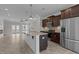 Spacious kitchen with stainless steel appliances, granite countertops, and a center island at 986 Gateway Commons Cir, Wake Forest, NC 27587