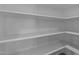 A simple pantry with multiple shelves for storing items at 986 Gateway Commons Cir, Wake Forest, NC 27587