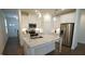 Beautiful kitchen with stainless steel appliances and granite countertops and a sizable kitchen island at 1009 Morrison Dr, Durham, NC 27703