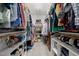 Walk-in closet with custom shelving and ample storage for clothes and accessories at 1013 New Chester Ct, Apex, NC 27502