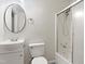 Clean bathroom with modern sink, toilet, and bathtub with shower at 1014 E Club Blvd, Durham, NC 27704