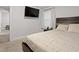 Bedroom featuring a bed, tv, nightstand, and entryway at 1014 E Club Blvd, Durham, NC 27704