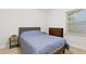 This bedroom features neutral walls, carpet, and view from the window at 1014 E Club Blvd, Durham, NC 27704