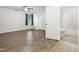 Bedroom with ensuite bathroom, ceiling fan, and closet for storage at 1014 E Club Blvd, Durham, NC 27704