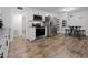 Modern kitchen features stainless steel appliances, ample counter space, and wood floors at 1014 E Club Blvd, Durham, NC 27704