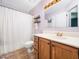 Clean bathroom with a shower, large vanity, and modern fixtures at 102 Heritage Ridge Ct, Knightdale, NC 27545
