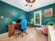 Stylish office with a blend of traditional and modern decor, with cozy seating and natural light at 102 Heritage Ridge Ct, Knightdale, NC 27545