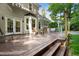 Backyard deck with an outdoor dining area and shade at 1025 Kingsway Dr, Apex, NC 27502