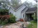 Exterior view of the home showcasing its architecture and surrounding landscape at 1036 Altice Dr, Raleigh, NC 27603