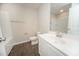 Well-lit bathroom with a modern vanity, toilet, and a shower-tub combo at 105 Ambergate Ct, Rocky Mount, NC 27804