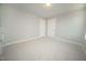 Neutral bedroom with carpet, light walls, base trim, and closet at 105 Ambergate Ct, Rocky Mount, NC 27804