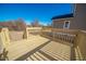 Exterior deck features wood flooring and railing with stairs surrounded by a green lawn at 105 Ambergate Ct, Rocky Mount, NC 27804