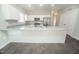 Beautiful kitchen with stainless steel appliances, white cabinets, and granite countertops at 105 Ambergate Ct, Rocky Mount, NC 27804