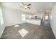 Bright, open-concept living area with wood floors that flows into a modern kitchen at 105 Ambergate Ct, Rocky Mount, NC 27804