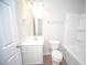 Bright bathroom with single sink vanity, modern fixtures, tub and shower at 109 Ambergate Ct, Rocky Mount, NC 27804