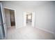 Comfortable bedroom with neutral carpet with view into the living area to create an open and comfortable space at 109 Ambergate Ct, Rocky Mount, NC 27804