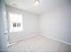 Bright bedroom with neutral carpet offers view of the front yard to create a relaxing and private space at 109 Ambergate Ct, Rocky Mount, NC 27804