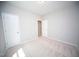 Bright bedroom with carpet flooring and two entry doors for easy access at 109 Ambergate Ct, Rocky Mount, NC 27804