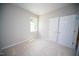Cozy bedroom with neutral carpet, double doors, and bright natural light to create a relaxing space at 109 Ambergate Ct, Rocky Mount, NC 27804