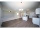 Open-concept kitchen featuring stainless steel appliances, ample counter space, and seamless flow to living area at 109 Ambergate Ct, Rocky Mount, NC 27804