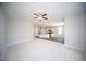 Open-concept living area flows into a modern kitchen with granite countertops and stainless steel appliances at 109 Ambergate Ct, Rocky Mount, NC 27804
