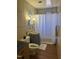 Bathroom with a vanity, white shower curtain, and classic tile work for a clean, functional space at 109 Stephens St, Chapel Hill, NC 27516