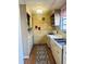 Functional kitchen featuring ample cabinet space, stainless steel sink, and a vintage aesthetic at 109 Stephens St, Chapel Hill, NC 27516