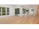 Spacious living room filled with natural light and access to a porch via sliding glass doors at 1120 Berwyn Way, Raleigh, NC 27615