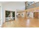 Bright living room with hardwood floors, large glass doors and views of the deck and backyard at 1120 Berwyn Way, Raleigh, NC 27615
