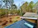 View of the wooded backyard from above at 13 Crosswinds Estates Dr, Pittsboro, NC 27312