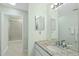 Bright bathroom features a large mirror, granite countertop and a separate shower area at 13 Crosswinds Estates Dr, Pittsboro, NC 27312