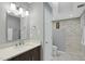 Updated bathroom with a walk-in shower, vanity, and stylish fixtures at 13 Crosswinds Estates Dr, Pittsboro, NC 27312