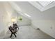 Cozy bonus room featuring a skylight, neutral decor, and natural light at 13 Crosswinds Estates Dr, Pittsboro, NC 27312