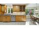 The kitchen features granite countertops, stainless steel appliances, and wood cabinets at 13 Crosswinds Estates Dr, Pittsboro, NC 27312
