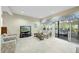Inviting living room featuring plush seating and seamless access to the sunroom at 13 Crosswinds Estates Dr, Pittsboro, NC 27312