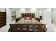Main bedroom featuring a king bed, bedside tables, and ample storage at 13 Crosswinds Estates Dr, Pittsboro, NC 27312