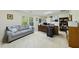 Spacious office with built-in shelving, work space, and comfortable sitting area at 13 Crosswinds Estates Dr, Pittsboro, NC 27312