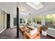 Sun room with skylights, a ceiling fan, and lots of windows providing ample natural light at 13 Crosswinds Estates Dr, Pittsboro, NC 27312