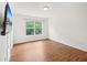 Bedroom showcasing durable wood-look flooring and a window bringing in natural light at 13 Pegram Ct, Durham, NC 27703